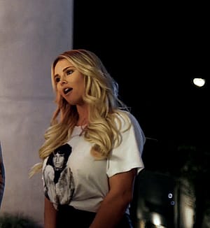 Kinsey Wolanski flashing in 'Slasher Party'(2019)'